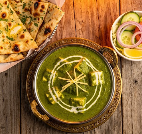 Fuelup Foods’ Palak Paneer served in a bowl, featuring soft paneer cubes cooked in a creamy, vibrant green spinach gravy — a classic North Indian vegetarian dish.